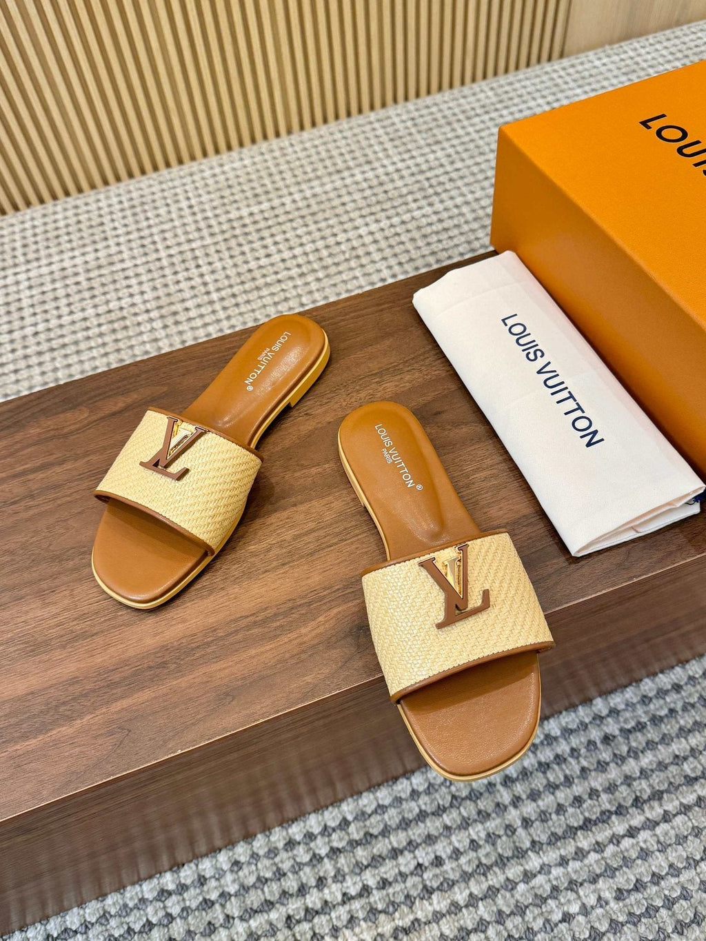 Louis Vuitton Textured Logo Slide Sandals — front