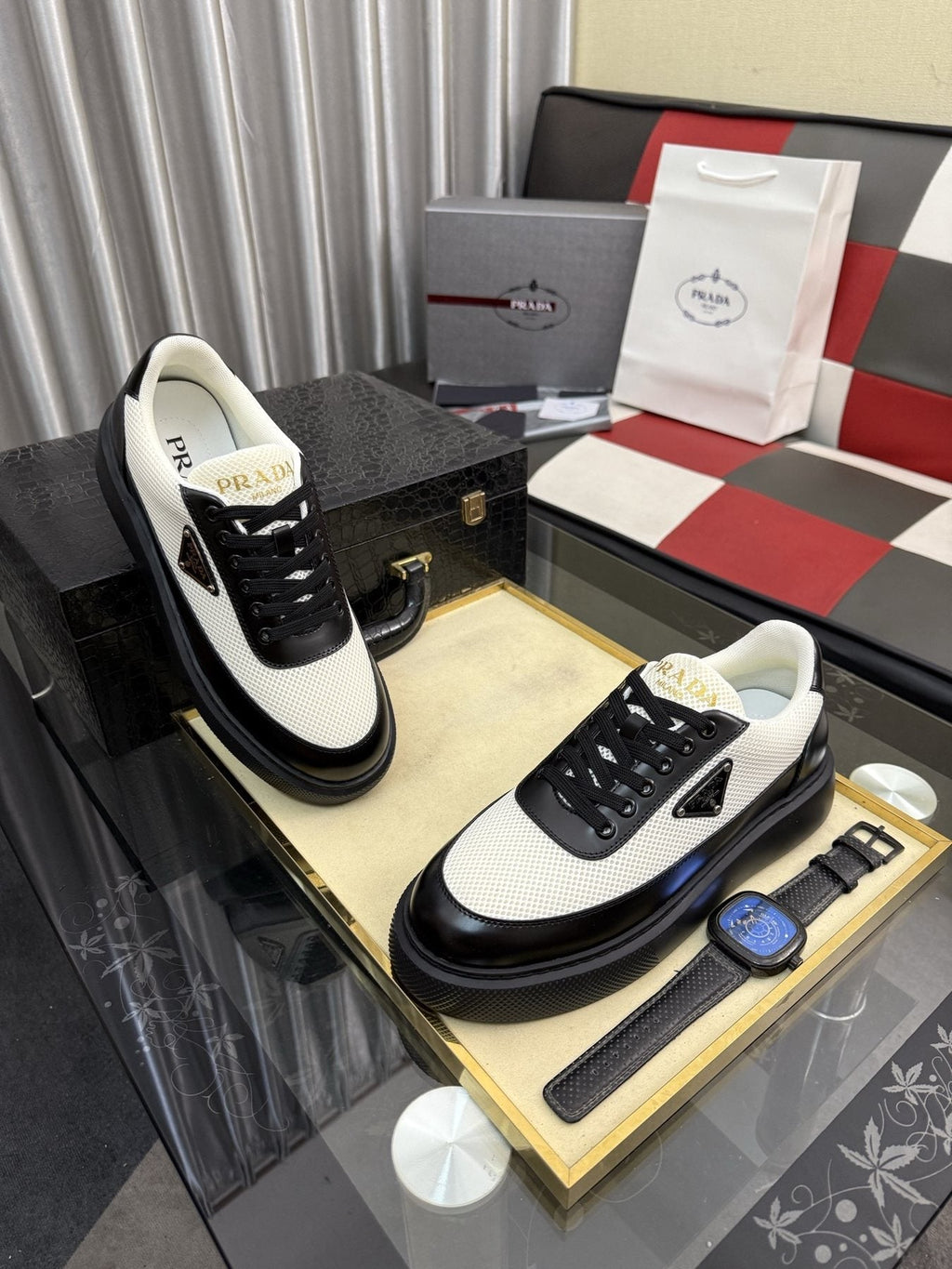 Prada Triangle Badge Low-Top Sneakers — model